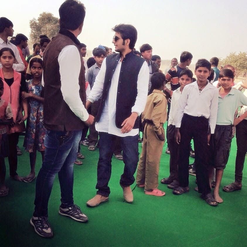 Akash Shukla with children at a Yuva Sankalpam education drive in Kanpur